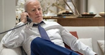 Joe Biden speaks on the phone with EPA Administrator Michael Regan and Ohio Governor Mike DeWine about the toxic train derailment in East Palestine, Ohio, Tuesday, Feb. 21, 2023, at the Warsaw Marriott Hotel. (Official White House photo by Adam Schultz)