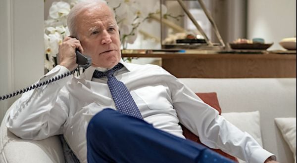 Joe Biden speaks on the phone with EPA Administrator Michael Regan and Ohio Governor Mike DeWine about the toxic train derailment in East Palestine, Ohio, Tuesday, Feb. 21, 2023, at the Warsaw Marriott Hotel. (Official White House photo by Adam Schultz)