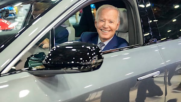 Joe Biden drives a Cadillac Lyriq at the North American International Auto Show Wednesday, Sept. 14, 2022, at Huntington Place in Detroit. (Official White House photo by Adam Schultz)